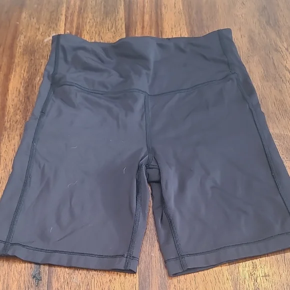 Athleta Ultimate Stash Biker Shorts Women’s S Black - Picture 2 of 5
